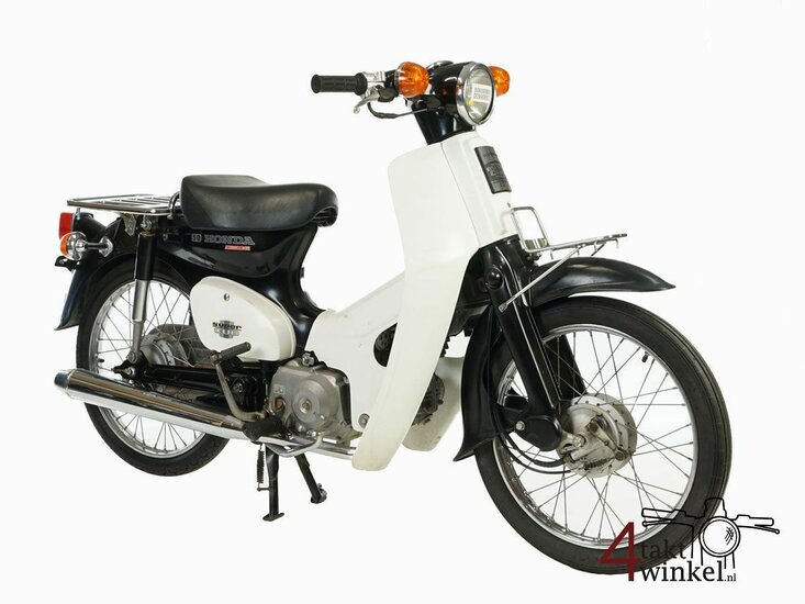 Sold! Honda C50 NT, noir, 13178km