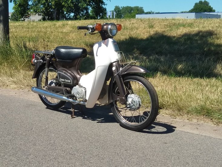 Honda C50 NT Japans, bruin, 4525 km, met kenteken