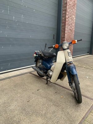 Honda C50, avec le travail