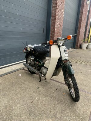 Honda C50, avec le travail