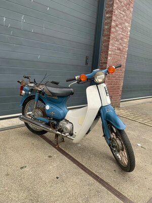 Honda C50, avec le travail