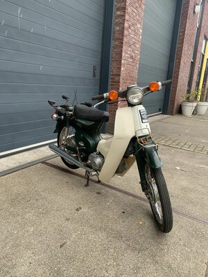 Honda C50, avec le travail