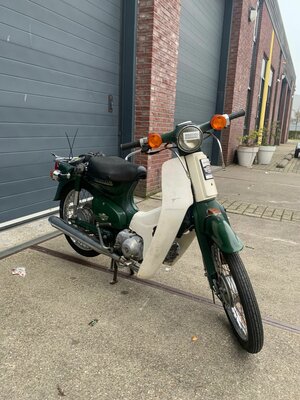 Honda C50, avec le travail