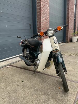 Honda C50, avec le travail