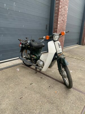 Honda C50, avec le travail