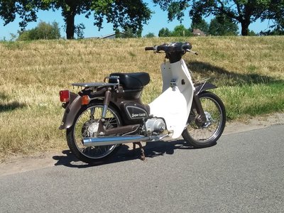 Honda C50 NT Japans, bruin, 4525 km, met kenteken